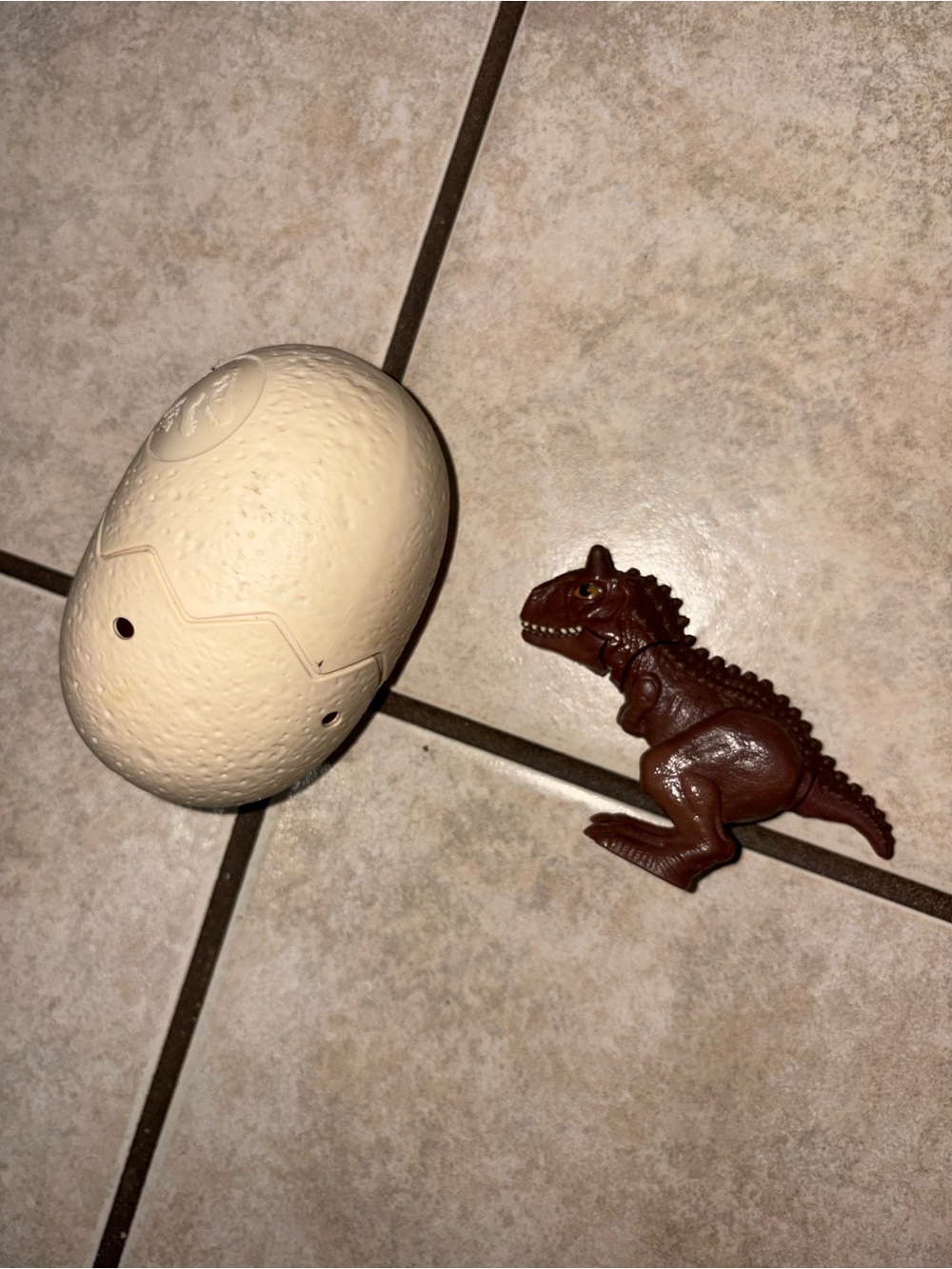 Jurassic world McDonald’s carnotaurus Dinosaur Hatchling Toy with Cream Egg